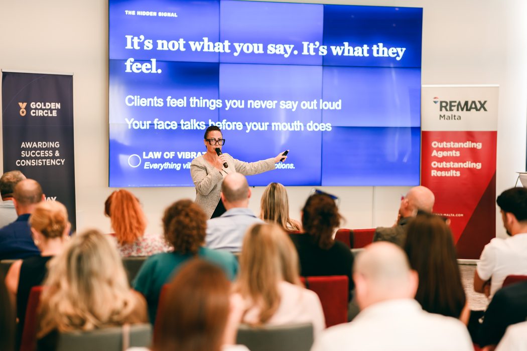 Alexia Stafrace speaking on emotional intelligence at a live event